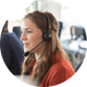 Smiling woman wearing call center headset