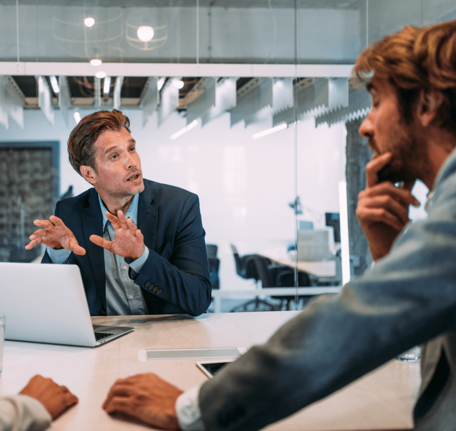 Businessmen having discussion in meeting room